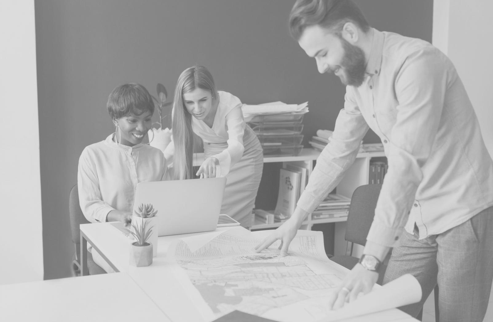 Modern office setup with multiple monitors showing API testing dashboards and integration workflows