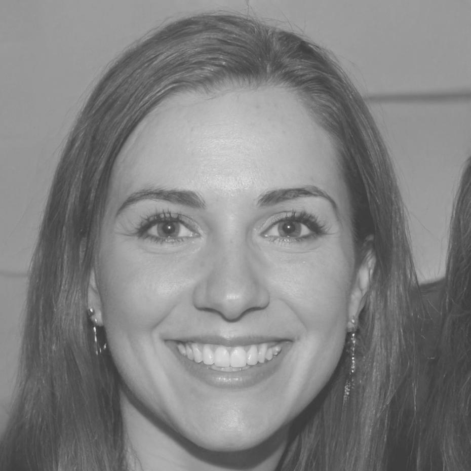 Senior instructor reviewing API documentation with students during a hands-on testing workshop session